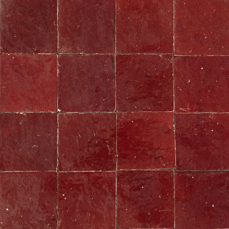 Handcrafted Bordeaux tiles showcasing intricate designs and deep tones for stunning wall decor.