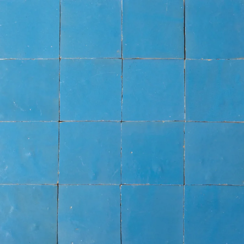 Handcrafted Light Blue Tiles showcasing intricate designs and refreshing tones for beautiful wall decor.