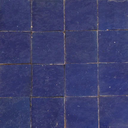 Handcrafted Navy Blue tiles showcasing intricate designs and deep tones for stunning wall decor.