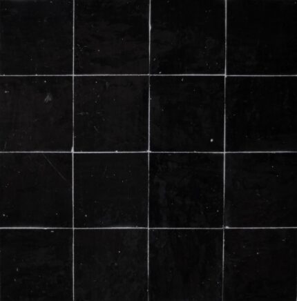 Handcrafted Black tiles showcasing intricate designs and luxurious tones for stunning wall decor.