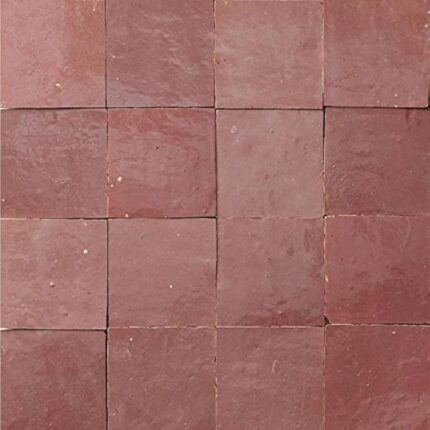 Handcrafted Pink tiles showcasing intricate designs and warm tones for beautiful wall decor.