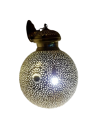 Moroccan glass hanging lamp casting enchanting shadows