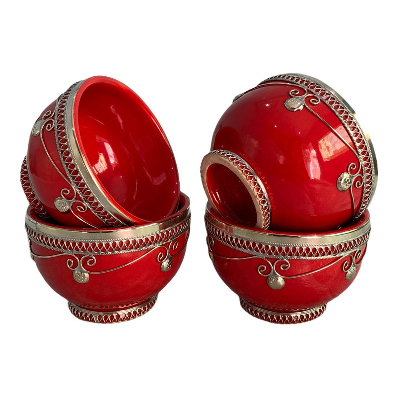 Set of 4 handcrafted red Moroccan ceramic bowls with intricate designs.