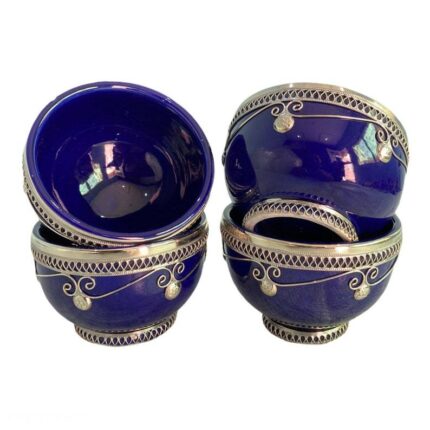 Set of 4 handcrafted blue Moroccan ceramic bowls with intricate designs.