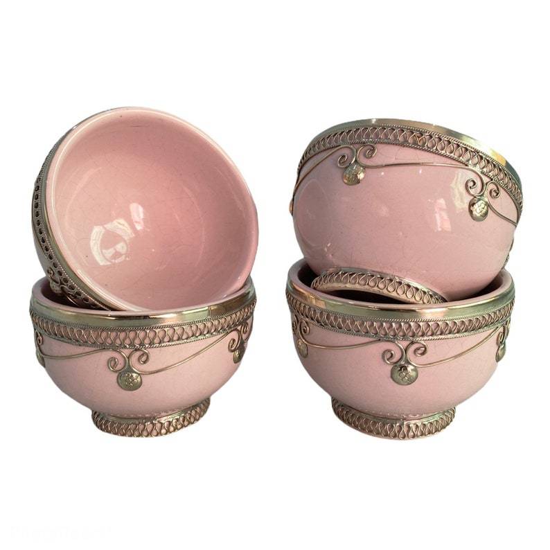 Set of 4 handcrafted pink Moroccan ceramic bowls with intricate designs.