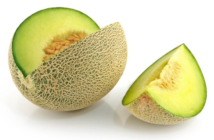 Fresh Moroccan green melons showcasing their vibrant color and juicy texture.