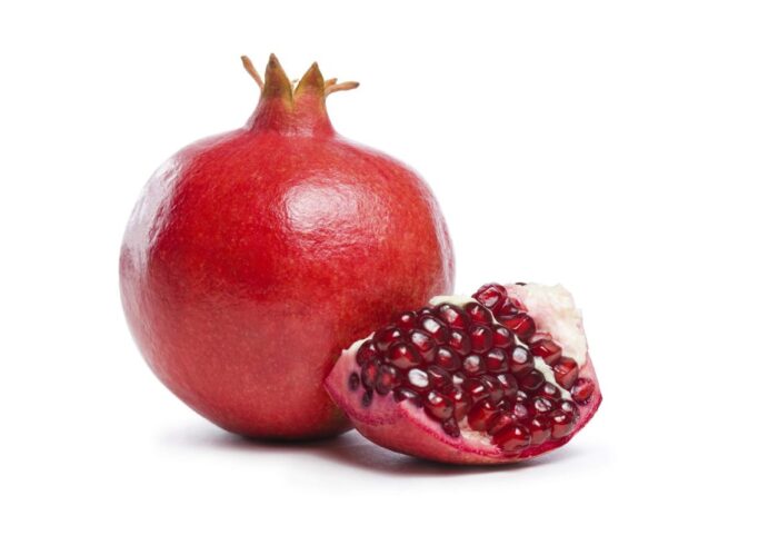 Fresh Moroccan pomegranates showcasing their vibrant color and juicy seeds.